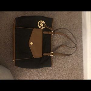 Black and brown Michael Kors purse